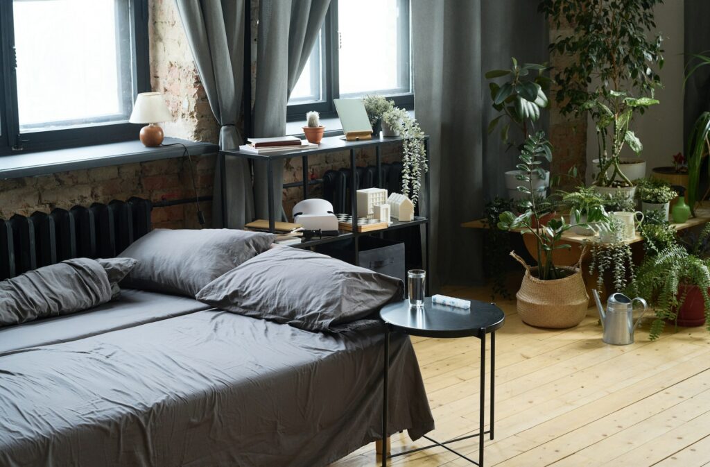 Bedroom with bed and house plants